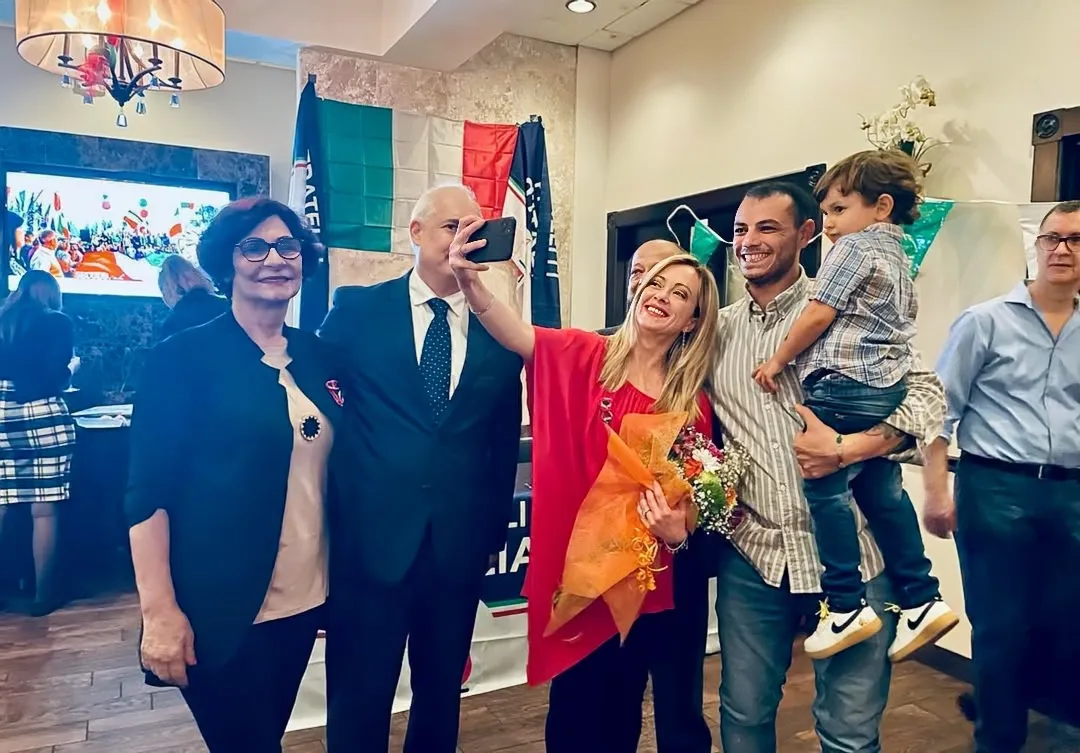 Giorgia Meloni celebrating at Vincenzo Cucina Italiana