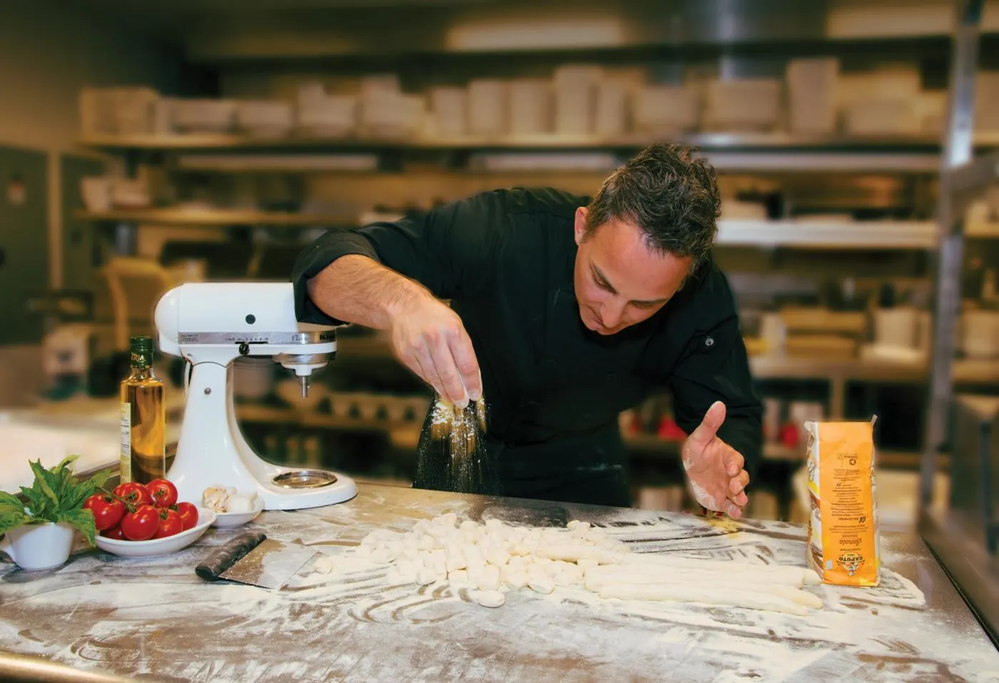 Chef making fresh pasta at Vincenzo