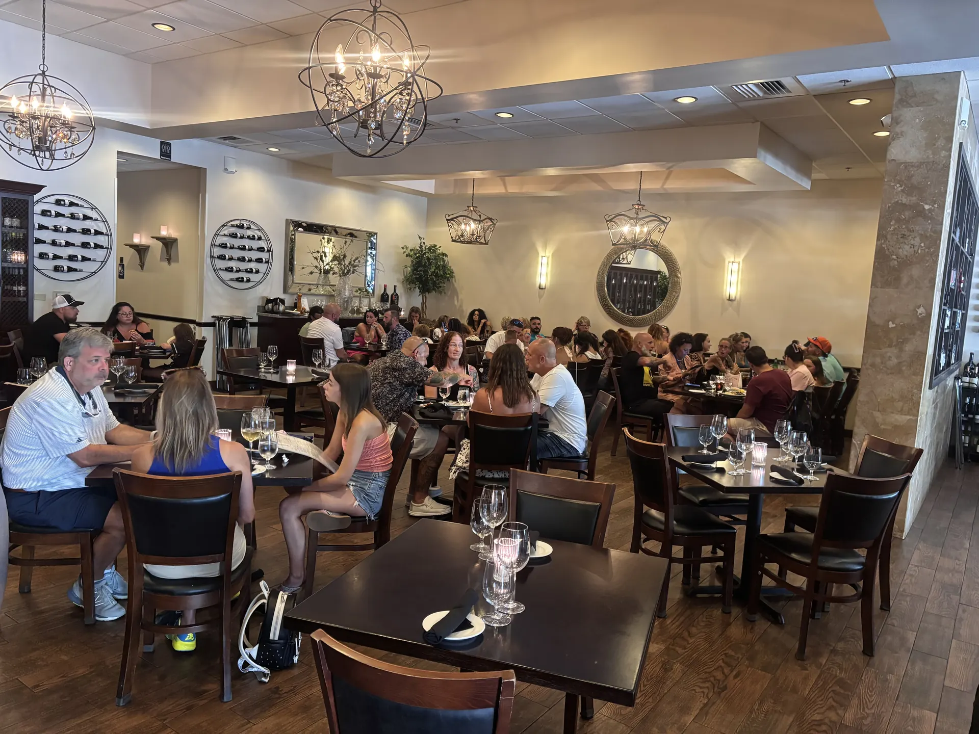Busy dining room with families at Vincenzo