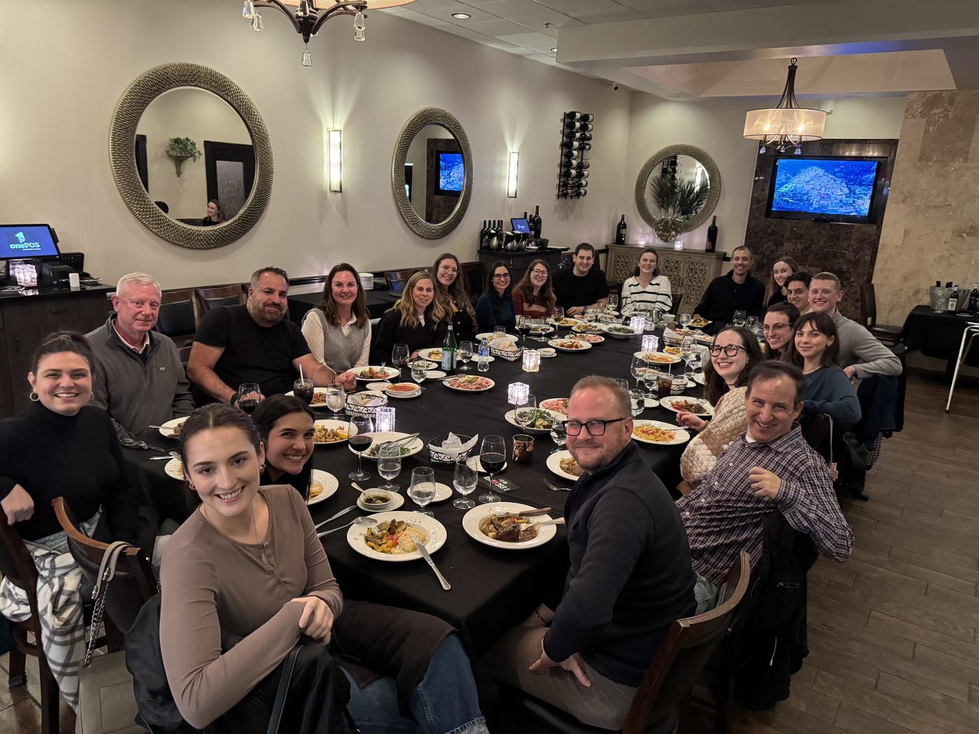 Big group enjoying dinner at Vincenzo