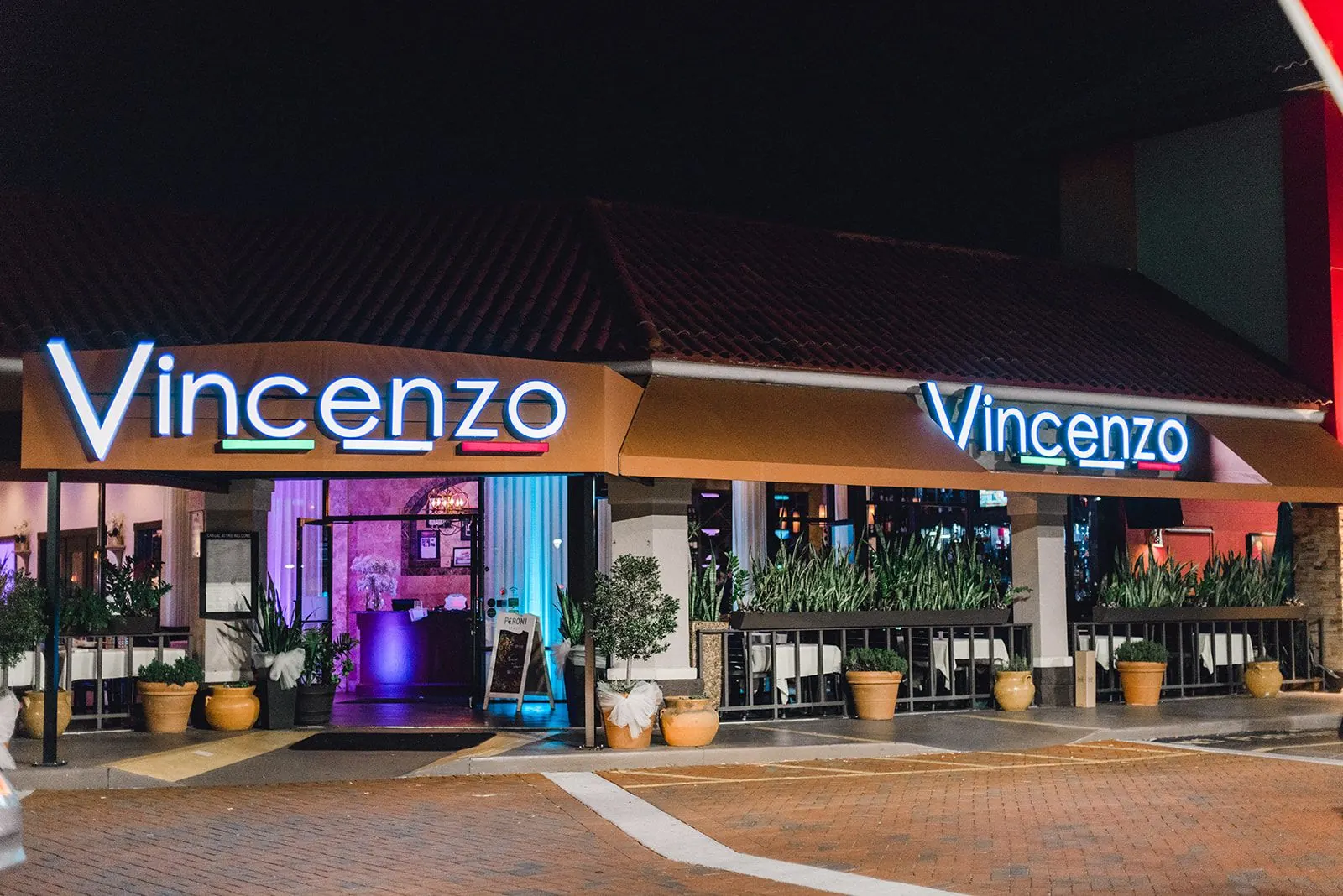 Vincenzo restaurant exterior at night on International Drive